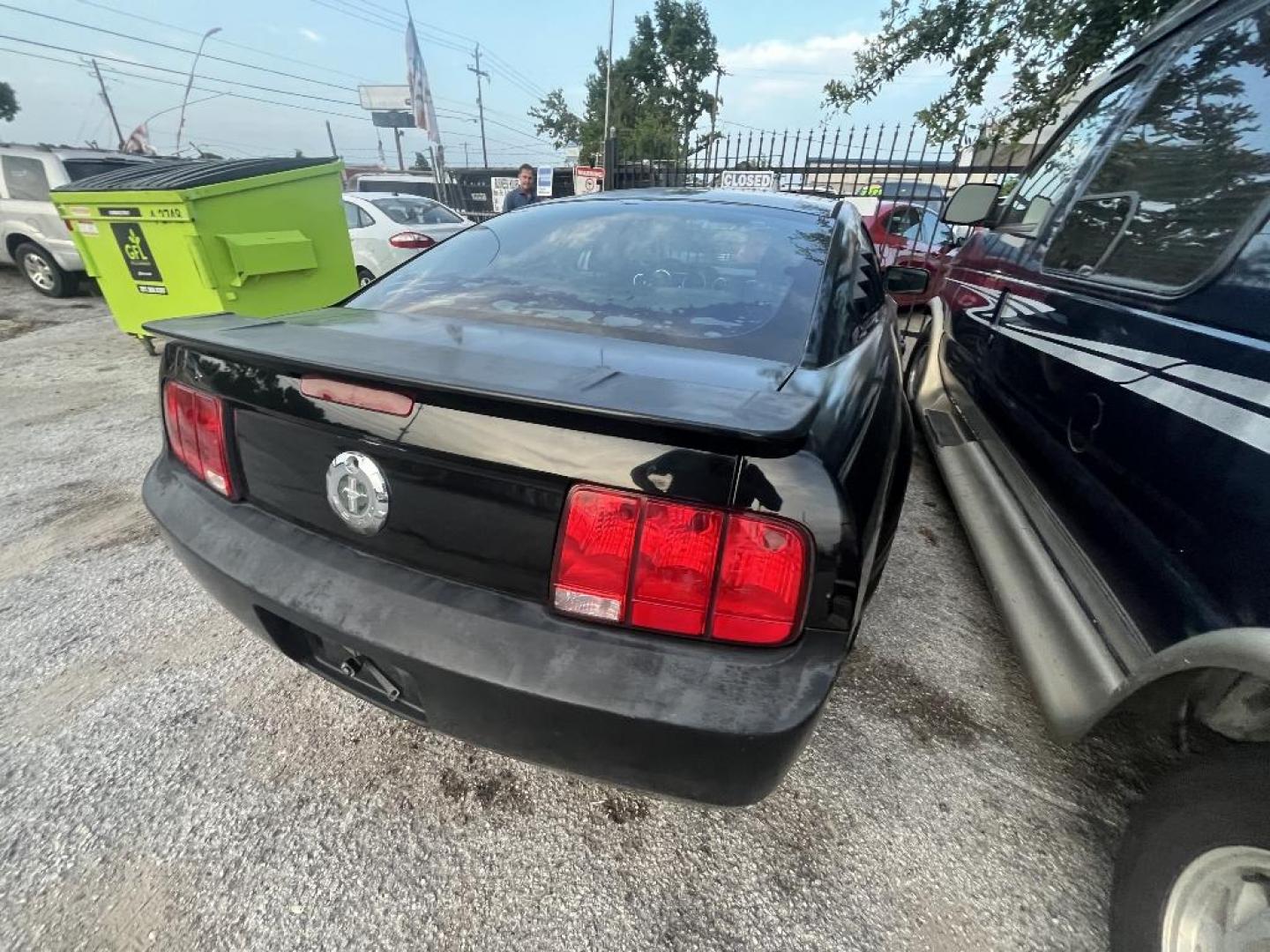 2008 BLACK FORD MUSTANG V6 Premium Coupe (1ZVHT80N585) with an 4.0L V6 SOHC 12V engine, AUTOMATIC transmission, located at 2303 West Mt. Houston, Houston, 77038, (281) 507-3956, 29.771597, -95.339569 - Photo#4