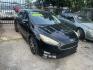 2016 BLACK FORD FOCUS SE Sedan (1FADP3F20GL) with an 2.0L L4 DOHC 16V engine, AUTOMATIC transmission, located at 2303 West Mt. Houston, Houston, 77038, (281) 507-3956, 29.771597, -95.339569 - Photo#0