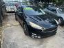2016 BLACK FORD FOCUS SE Sedan (1FADP3F20GL) with an 2.0L L4 DOHC 16V engine, AUTOMATIC transmission, located at 2303 West Mt. Houston, Houston, 77038, (281) 507-3956, 29.771597, -95.339569 - Photo#2