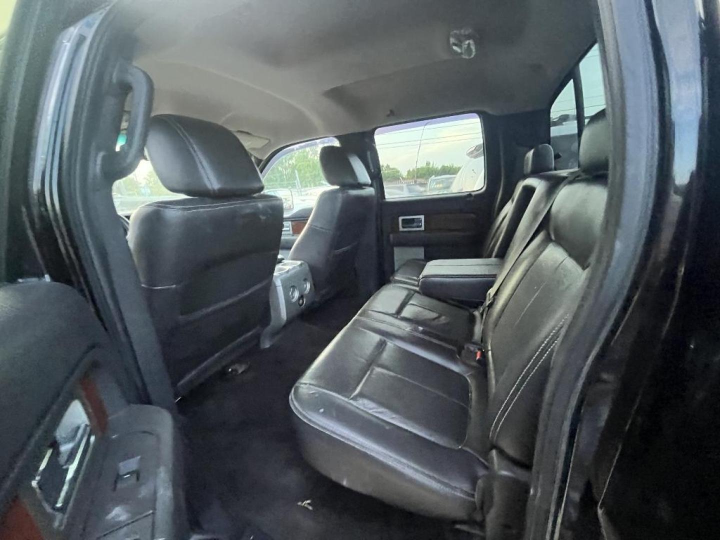 2009 BROWN FORD F-150 XLT SuperCrew 6.5-ft. Bed 4WD (1FTPW14V89K) with an 5.4L V8 SOHC 24V FFV engine, AUTOMATIC transmission, located at 2303 West Mt. Houston, Houston, 77038, (281) 507-3956, 29.771597, -95.339569 - Photo#2