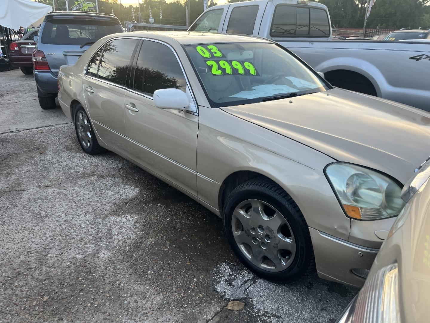 2003 GOLD LEXUS LS 430 Sedan (JTHBN30F430) with an 4.3L V8 DOHC 32V engine, AUTOMATIC transmission, located at 2303 West Mt. Houston, Houston, 77038, (281) 507-3956, 29.771597, -95.339569- Photo#0