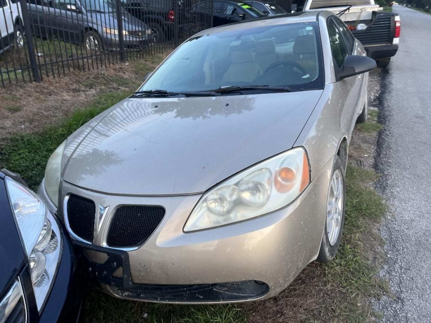 2005 BROWN PONTIAC G6 Base (1G2ZG528X54) with an 3.5L V6 OHV 12V engine, AUTOMATIC transmission, located at 2303 West Mt. Houston, Houston, 77038, (281) 507-3956, 29.771597, -95.339569 - Photo#1