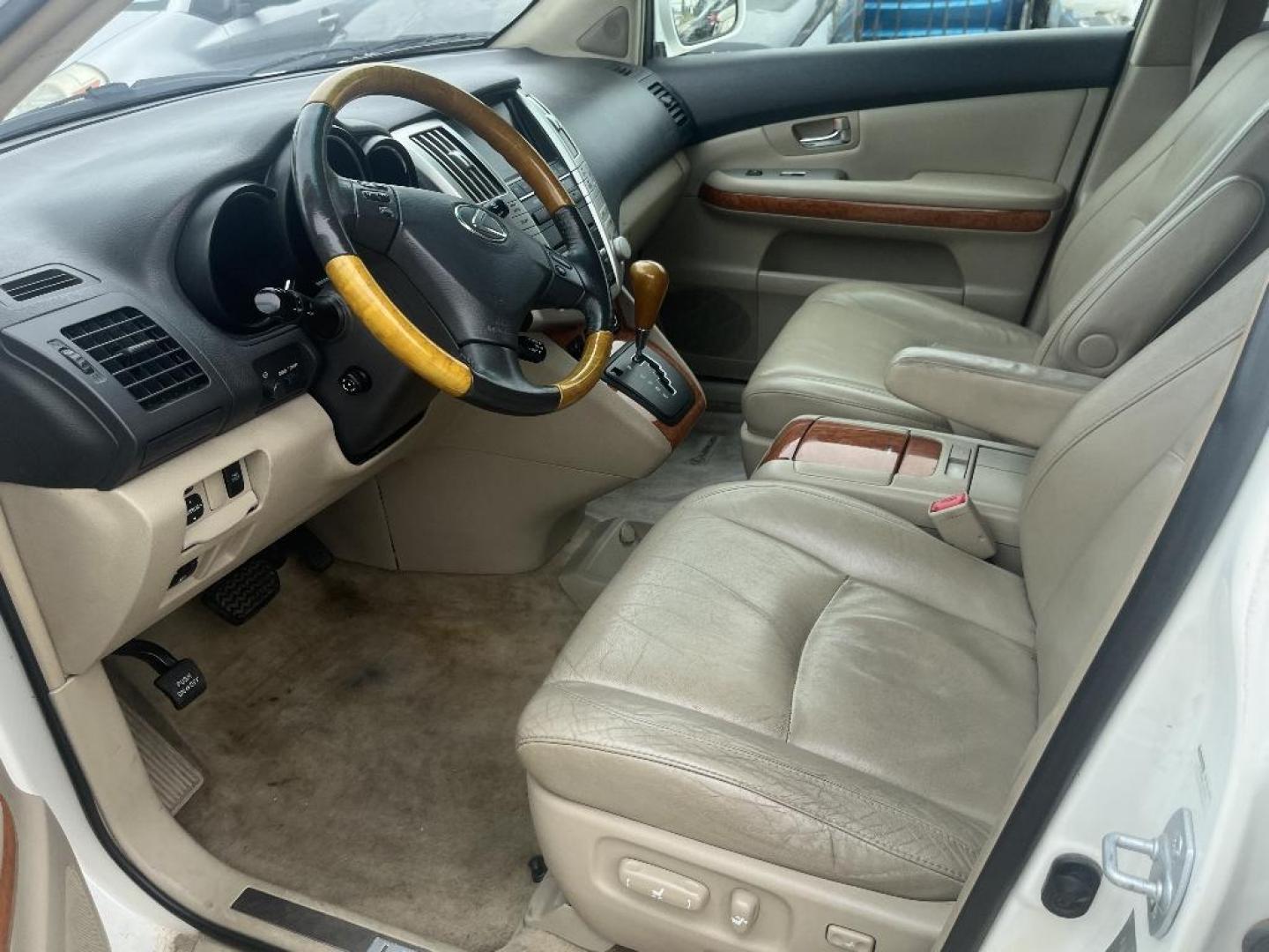 2007 WHITE LEXUS RX 400H AWD (JTJHW31UX72) with an 3.3L V6 DOHC 24V HYBRID engine, AUTOMATIC transmission, located at 2303 West Mt. Houston, Houston, 77038, (281) 507-3956, 29.771597, -95.339569 - Photo#2
