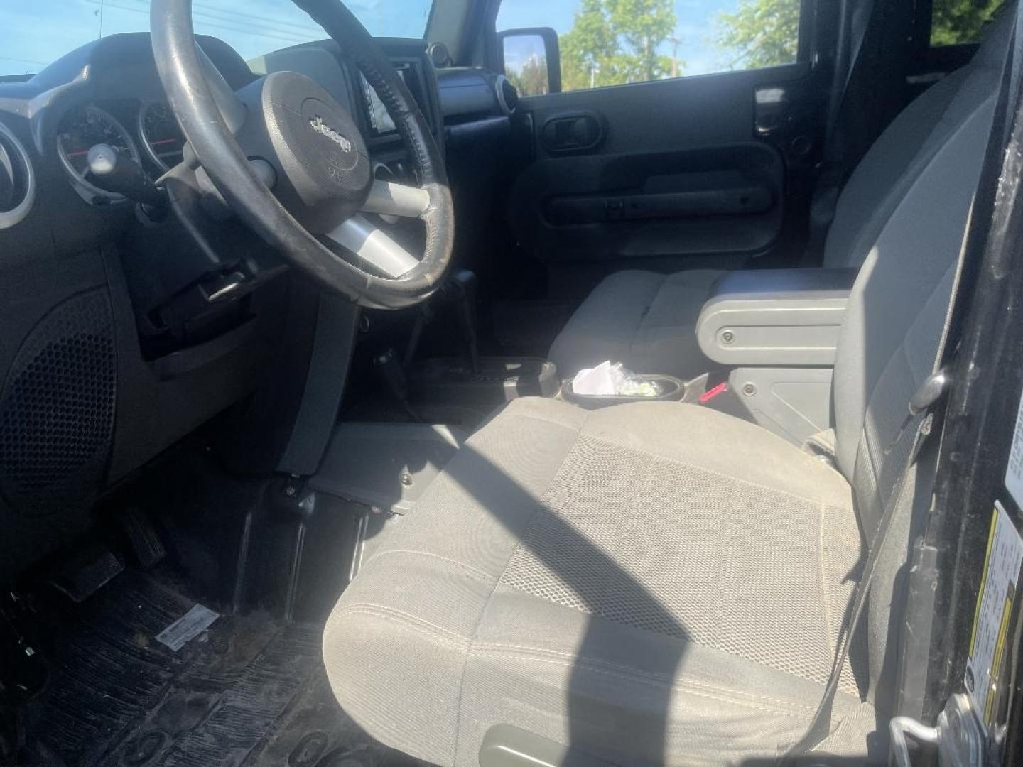 2008 BLACK JEEP WRANGLER Unlimited Sahara 4WD (1J8GA59118L) with an 3.8L V6 OHV 12V engine, AUTOMATIC transmission, located at 2303 West Mt. Houston, Houston, 77038, (281) 507-3956, 29.771597, -95.339569 - Photo#2