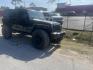 2008 BLACK JEEP WRANGLER Unlimited Sahara 4WD (1J8GA59118L) with an 3.8L V6 OHV 12V engine, AUTOMATIC transmission, located at 2303 West Mt. Houston, Houston, 77038, (281) 507-3956, 29.771597, -95.339569 - Photo#3