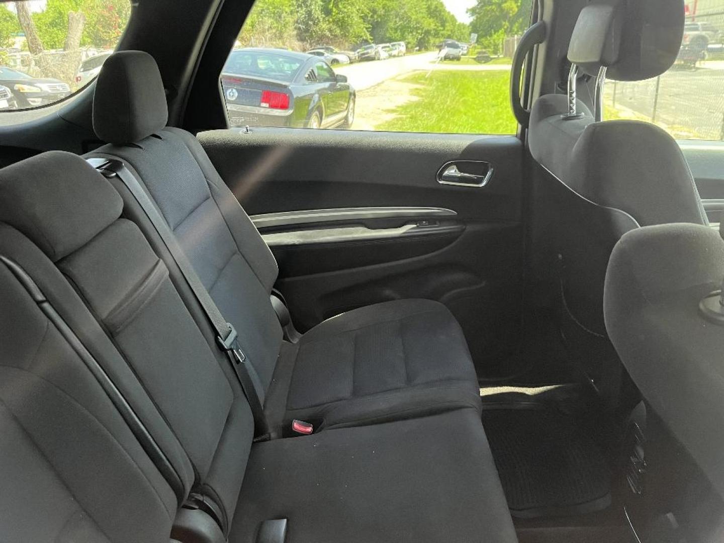 2017 BLACK DODGE DURANGO SXT RWD (1C4RDHAG7HC) with an 3.6L V6 DOHC 24V engine, AUTOMATIC transmission, located at 2303 West Mt. Houston, Houston, 77038, (281) 507-3956, 29.771597, -95.339569 - Photo#4