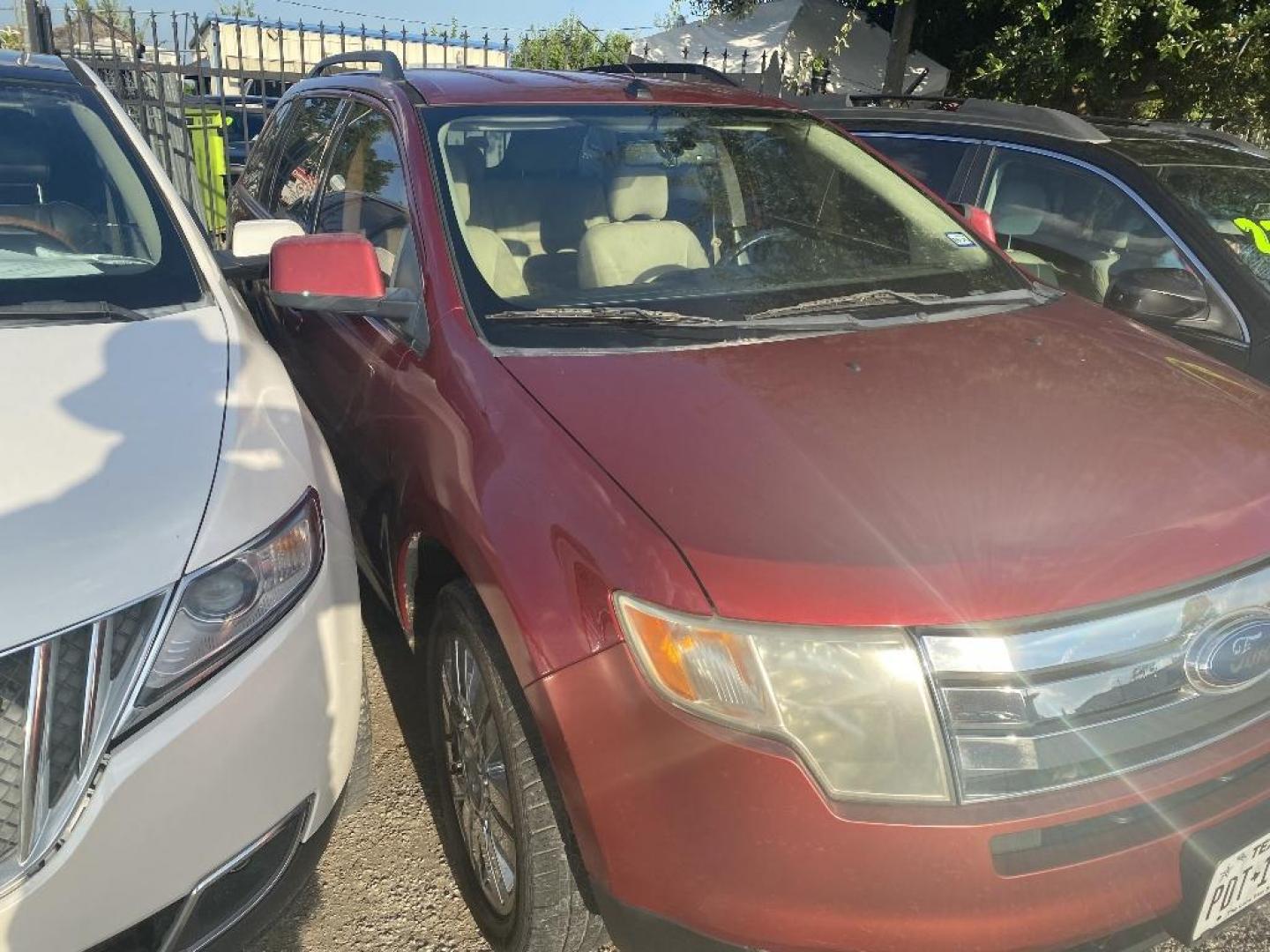 2009 RED FORD EDGE SEL FWD (2FMDK38C29B) with an 3.5L V6 DOHC 24V engine, AUTOMATIC transmission, located at 2303 West Mt. Houston, Houston, 77038, (281) 507-3956, 29.771597, -95.339569 - Photo#2