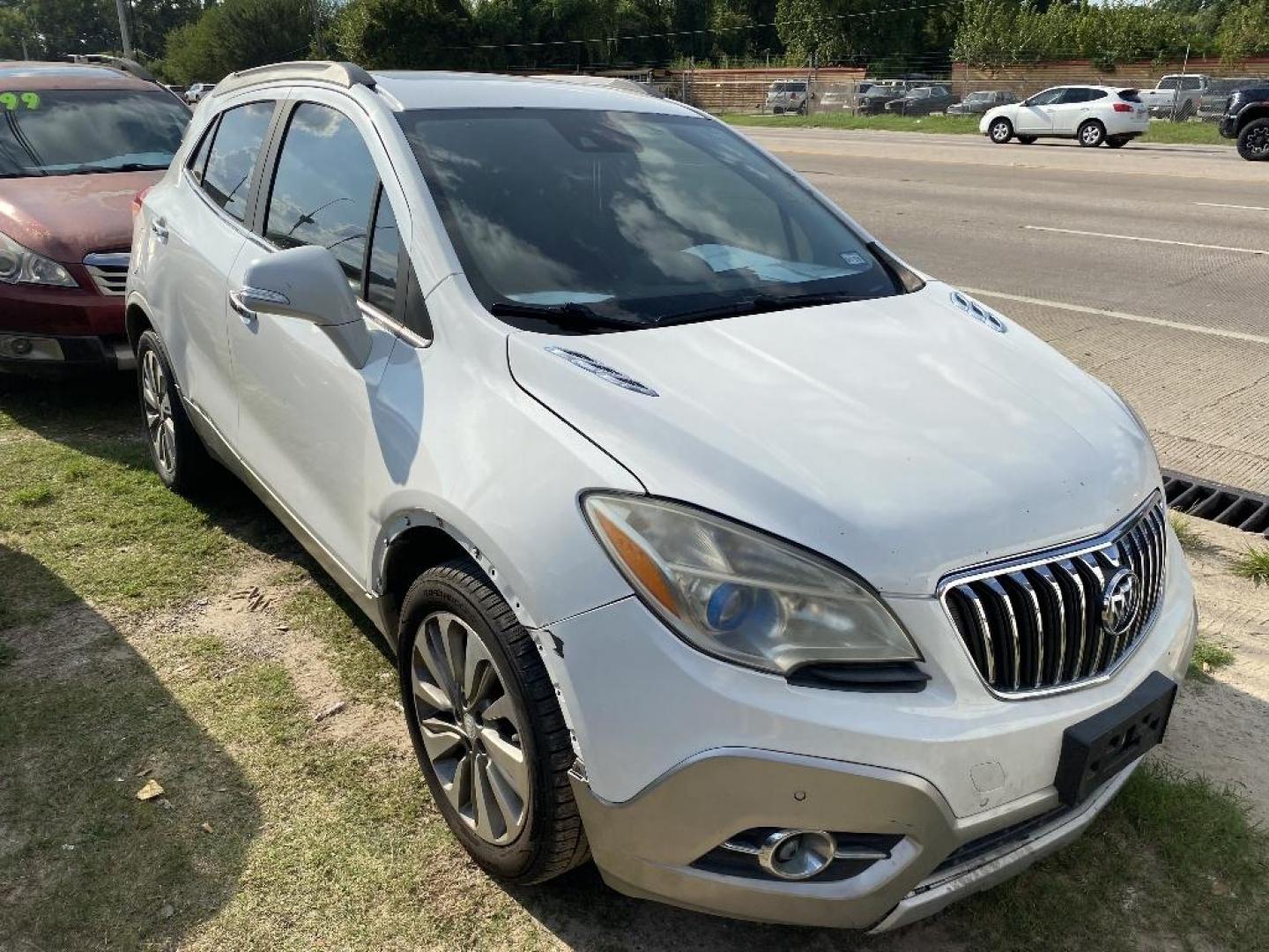 2016 WHITE BUICK ENCORE Premium FWD (KL4CJDSB1GB) with an 1.4L L4 DOHC 16V TURBO engine, 6-SPEED AUTOMATIC transmission, located at 2303 West Mt. Houston, Houston, 77038, (281) 507-3956, 29.771597, -95.339569 - Photo#1