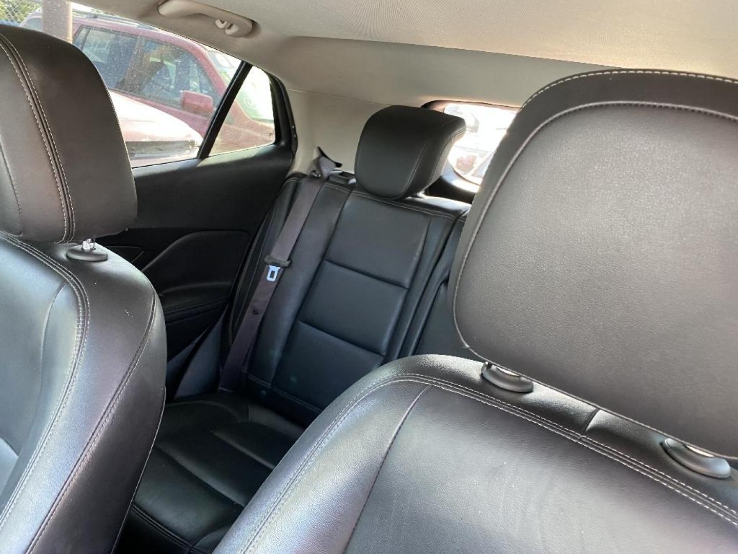 2016 WHITE BUICK ENCORE Premium FWD (KL4CJDSB1GB) with an 1.4L L4 DOHC 16V TURBO engine, 6-SPEED AUTOMATIC transmission, located at 2303 West Mt. Houston, Houston, 77038, (281) 507-3956, 29.771597, -95.339569 - Photo#2
