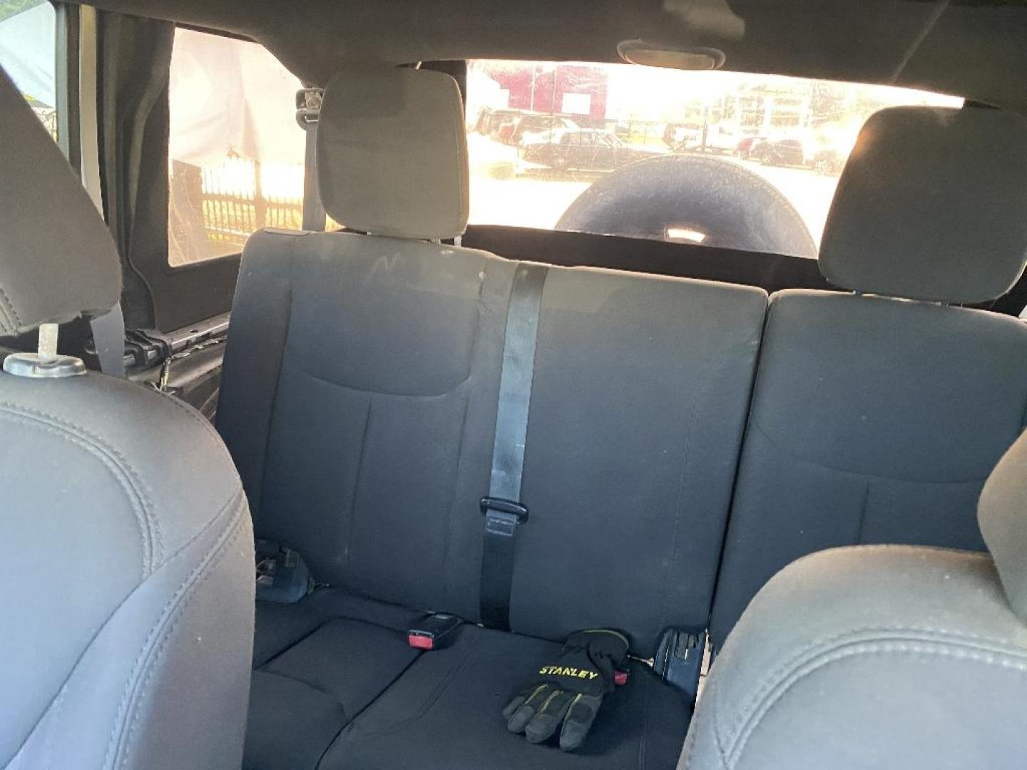 2014 BLACK JEEP WRANGLER Unlimited Sport 4WD (1C4HJWDGXEL) with an 3.6L V6 DOHC 24V FFV engine, AUTOMATIC transmission, located at 2303 West Mt. Houston, Houston, 77038, (281) 507-3956, 29.771597, -95.339569 - Photo#3