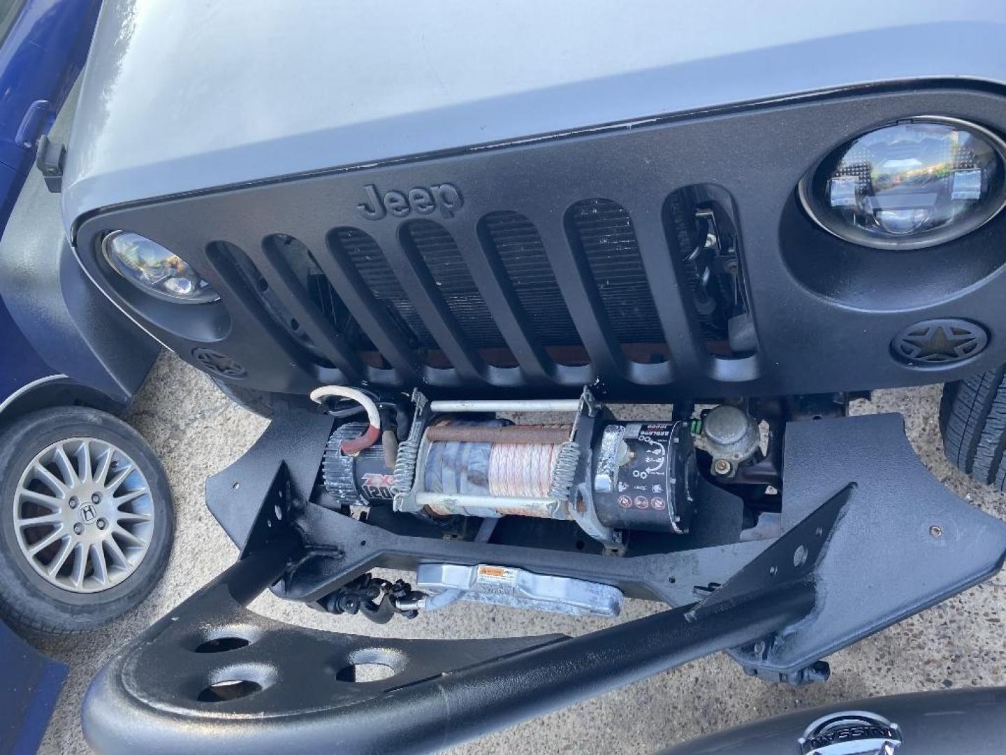 2014 BLACK JEEP WRANGLER Unlimited Sport 4WD (1C4HJWDGXEL) with an 3.6L V6 DOHC 24V FFV engine, AUTOMATIC transmission, located at 2303 West Mt. Houston, Houston, 77038, (281) 507-3956, 29.771597, -95.339569 - Photo#5