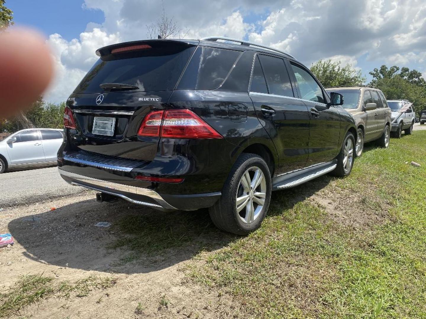 2013 BLACK MERCEDES M ML350 BlueTEC (4JGDA2EB5DA) with an 3.0L V6 DOHC 24V TURBO DIESEL engine, AUTOMATIC transmission, located at 2303 West Mt. Houston, Houston, 77038, (281) 507-3956, 29.771597, -95.339569 - Photo#1