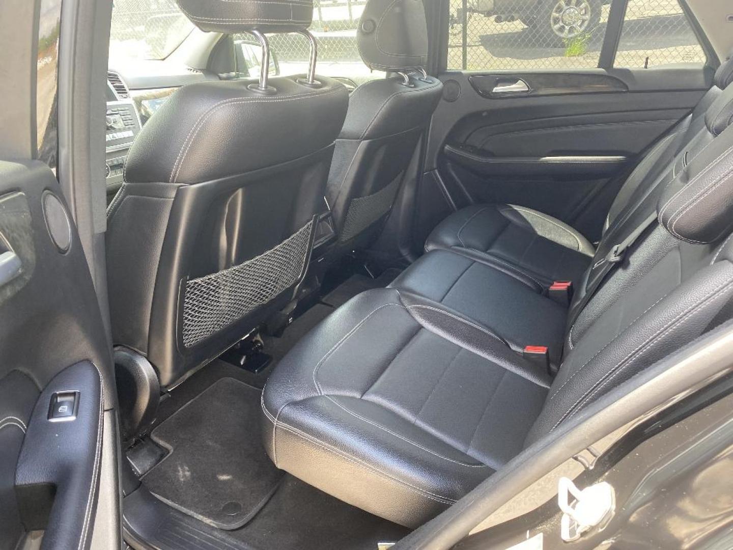 2013 BLACK MERCEDES M ML350 BlueTEC (4JGDA2EB5DA) with an 3.0L V6 DOHC 24V TURBO DIESEL engine, AUTOMATIC transmission, located at 2303 West Mt. Houston, Houston, 77038, (281) 507-3956, 29.771597, -95.339569 - Photo#3