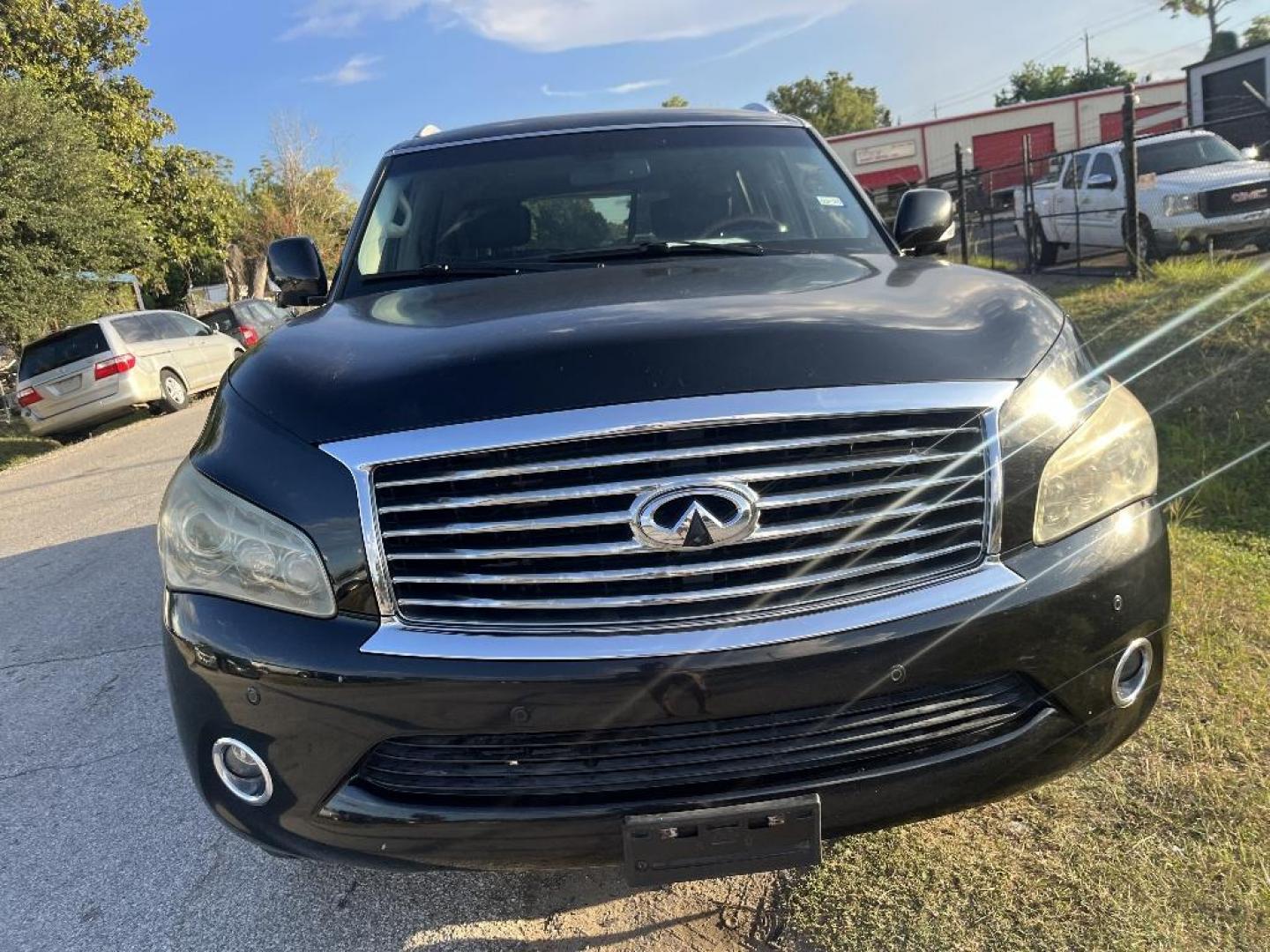 2014 BLACK INFINITI QX80 2WD (JN8AZ2NF5E9) with an 5.6L V8 DOHC 32V engine, AUTOMATIC transmission, located at 2303 West Mt. Houston, Houston, 77038, (281) 507-3956, 29.771597, -95.339569 - Photo#0