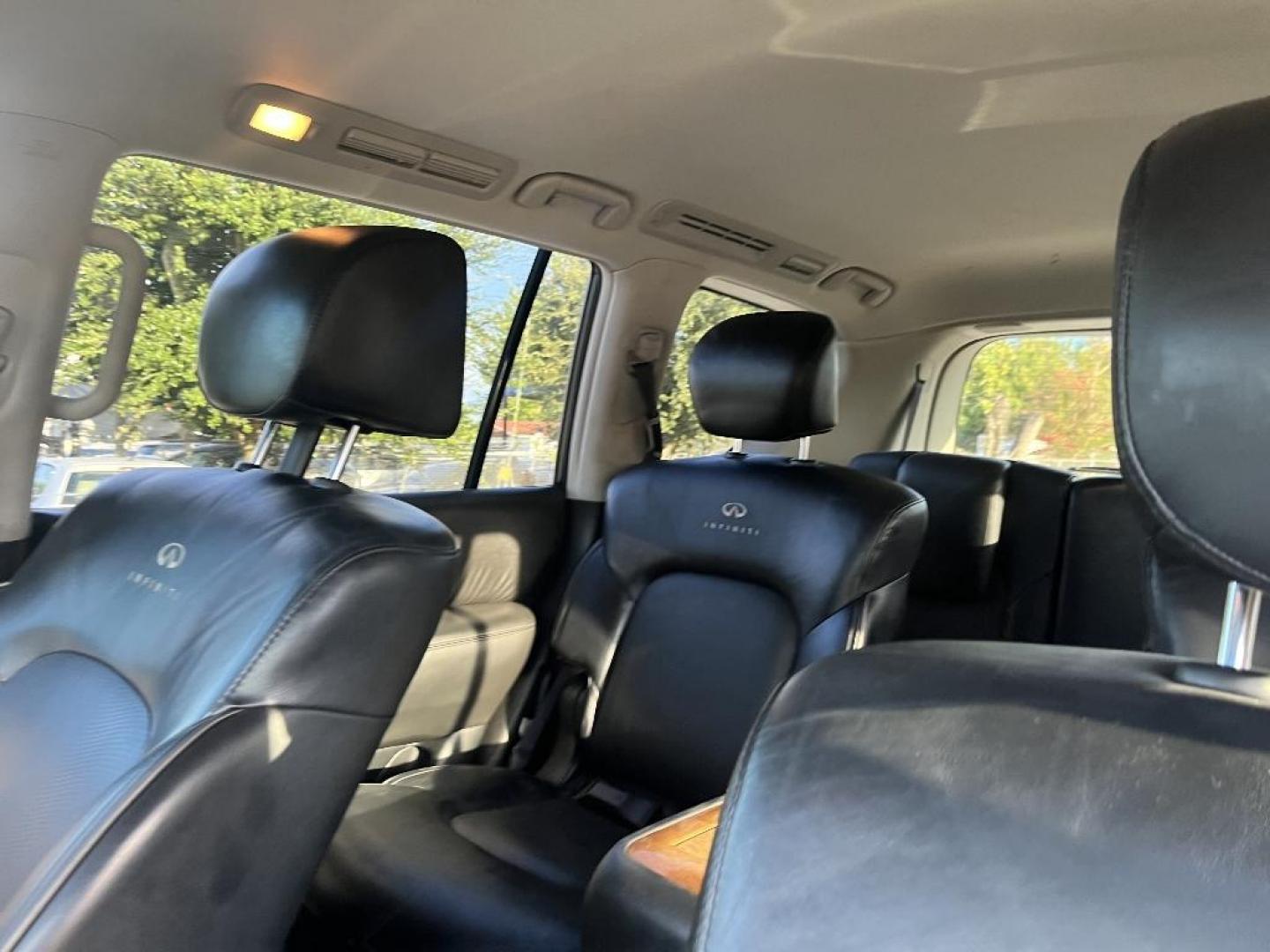2014 BLACK INFINITI QX80 2WD (JN8AZ2NF5E9) with an 5.6L V8 DOHC 32V engine, AUTOMATIC transmission, located at 2303 West Mt. Houston, Houston, 77038, (281) 507-3956, 29.771597, -95.339569 - Photo#2