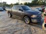 2016 GRAY RAM 1500 SLT Crew Cab SWB 4WD (1C6RR7LT4GS) with an 5.7L V8 OHV 16V engine, AUTOMATIC transmission, located at 2303 West Mt. Houston, Houston, 77038, (281) 507-3956, 29.771597, -95.339569 - Photo#0