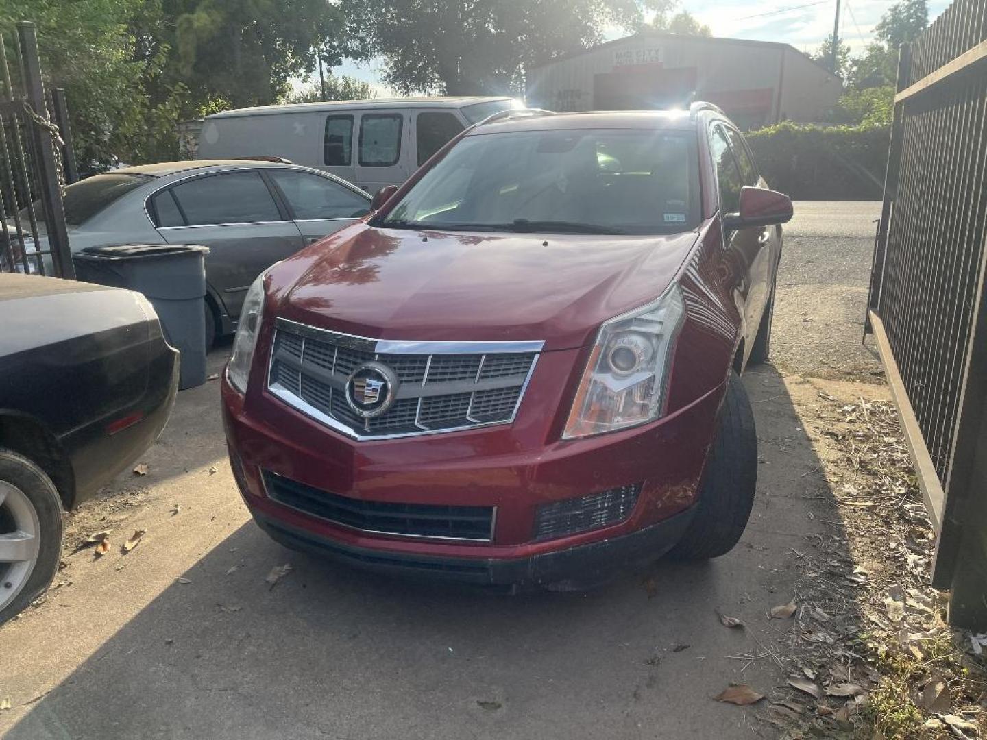 2010 RED CADILLAC SRX Luxury Collection (3GYFNAEY8AS) with an 3.0L V6 DOHC 24V engine, AUTOMATIC transmission, located at 2303 West Mt. Houston, Houston, 77038, (281) 507-3956, 29.771597, -95.339569 - Photo#0