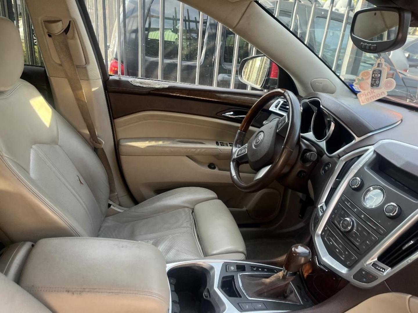 2010 RED CADILLAC SRX Luxury Collection (3GYFNAEY8AS) with an 3.0L V6 DOHC 24V engine, AUTOMATIC transmission, located at 2303 West Mt. Houston, Houston, 77038, (281) 507-3956, 29.771597, -95.339569 - Photo#3