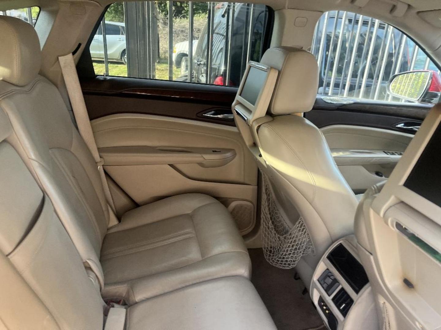 2010 RED CADILLAC SRX Luxury Collection (3GYFNAEY8AS) with an 3.0L V6 DOHC 24V engine, AUTOMATIC transmission, located at 2303 West Mt. Houston, Houston, 77038, (281) 507-3956, 29.771597, -95.339569 - Photo#4