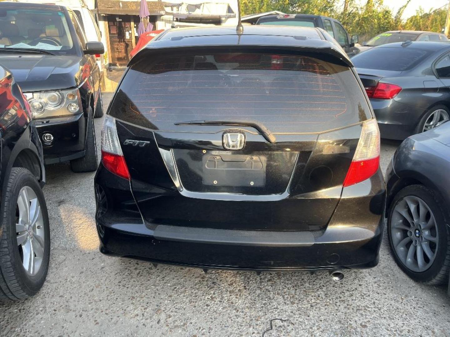2012 BLACK HONDA FIT Sport 5-Speed AT (JHMGE8H53CC) with an 1.5L L4 SOHC 16V engine, AUTOMATIC transmission, located at 2303 West Mt. Houston, Houston, 77038, (281) 507-3956, 29.771597, -95.339569 - Photo#2
