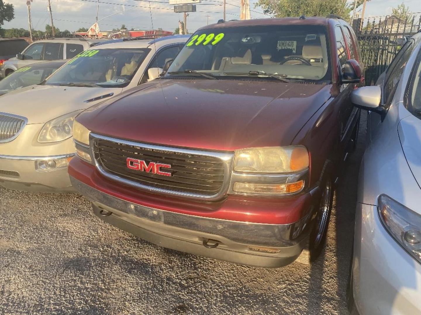 2005 RED GMC YUKON 2WD (1GKEC13T05R) with an 5.3L V8 OHV 16V engine, AUTOMATIC transmission, located at 2303 West Mt. Houston, Houston, 77038, (281) 507-3956, 29.771597, -95.339569 - Photo#0