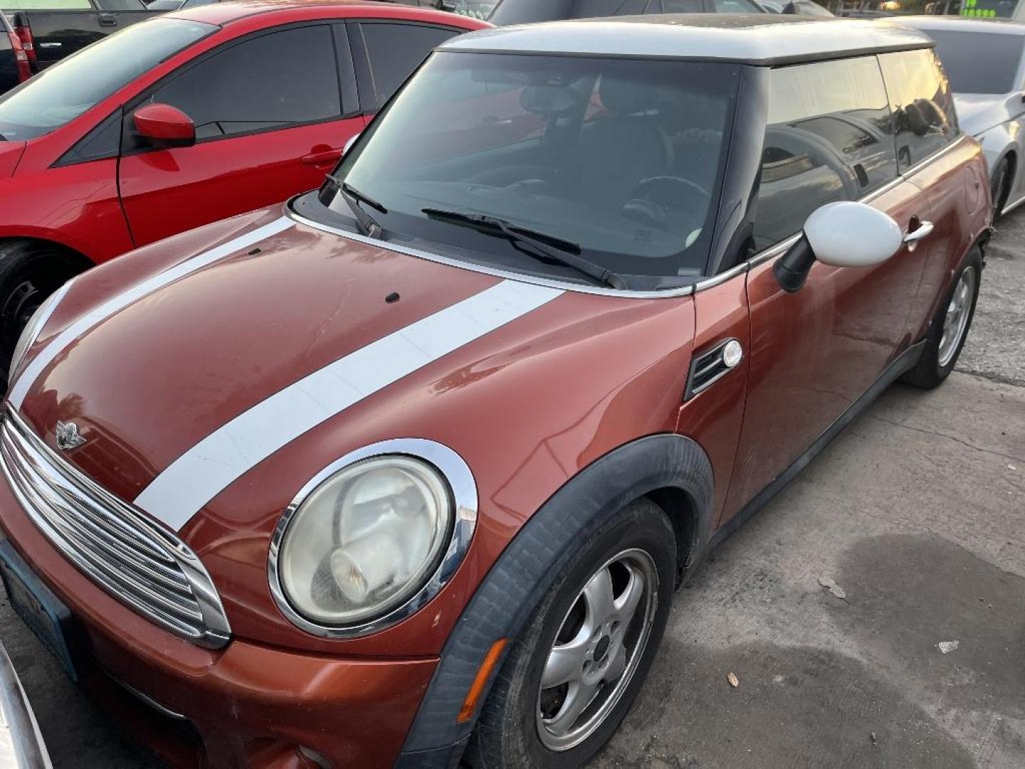 2011 ORANGE MINI COOPER Base (WMWSU3C5XBT) with an 1.6L L4 DOHC 16V TURBO engine, AUTOMATIC transmission, located at 2303 West Mt. Houston, Houston, 77038, (281) 507-3956, 29.771597, -95.339569 - Photo#0