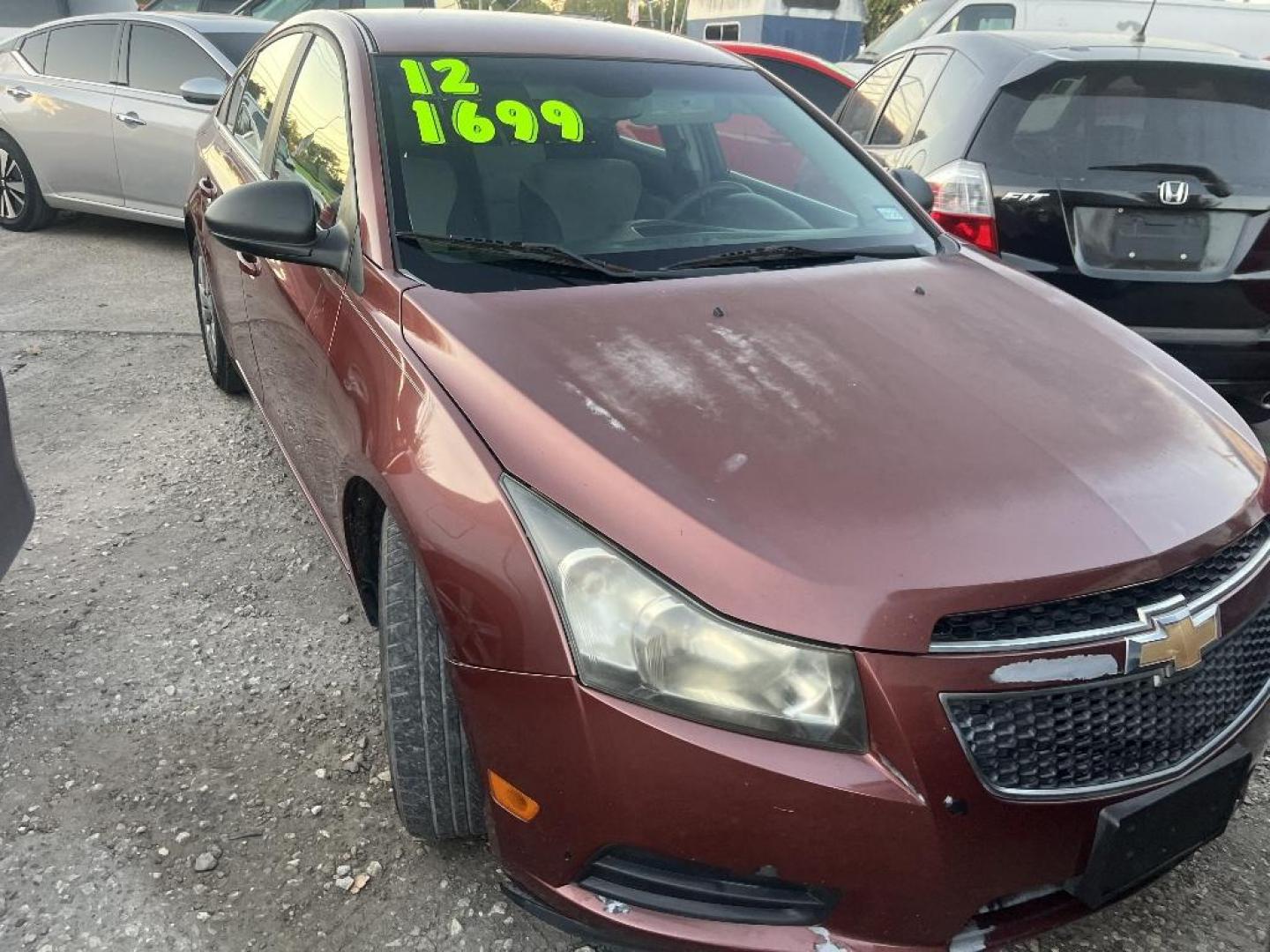 2012 RED CHEVROLET CRUZE 2LS (1G1PC5SH5C7) with an 1.8L L4 DOHC 16V FFV engine, AUTOMATIC transmission, located at 2303 West Mt. Houston, Houston, 77038, (281) 507-3956, 29.771597, -95.339569 - Photo#0