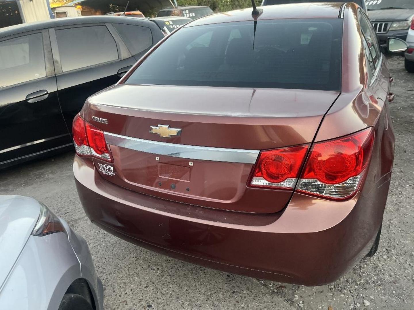 2012 RED CHEVROLET CRUZE 2LS (1G1PC5SH5C7) with an 1.8L L4 DOHC 16V FFV engine, AUTOMATIC transmission, located at 2303 West Mt. Houston, Houston, 77038, (281) 507-3956, 29.771597, -95.339569 - Photo#2