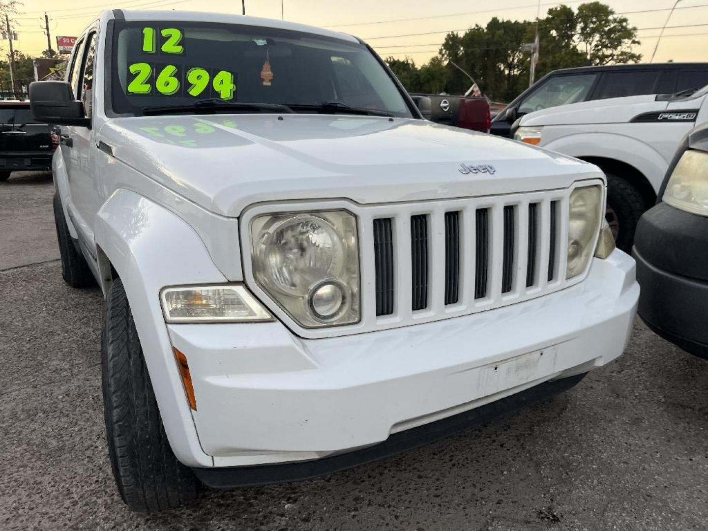 2012 WHITE JEEP LIBERTY Sport 2WD (1C4PJLAK0CW) with an 3.7L V6 SOHC 12V engine, AUTOMATIC transmission, located at 2303 West Mt. Houston, Houston, 77038, (281) 507-3956, 29.771597, -95.339569 - Photo#0