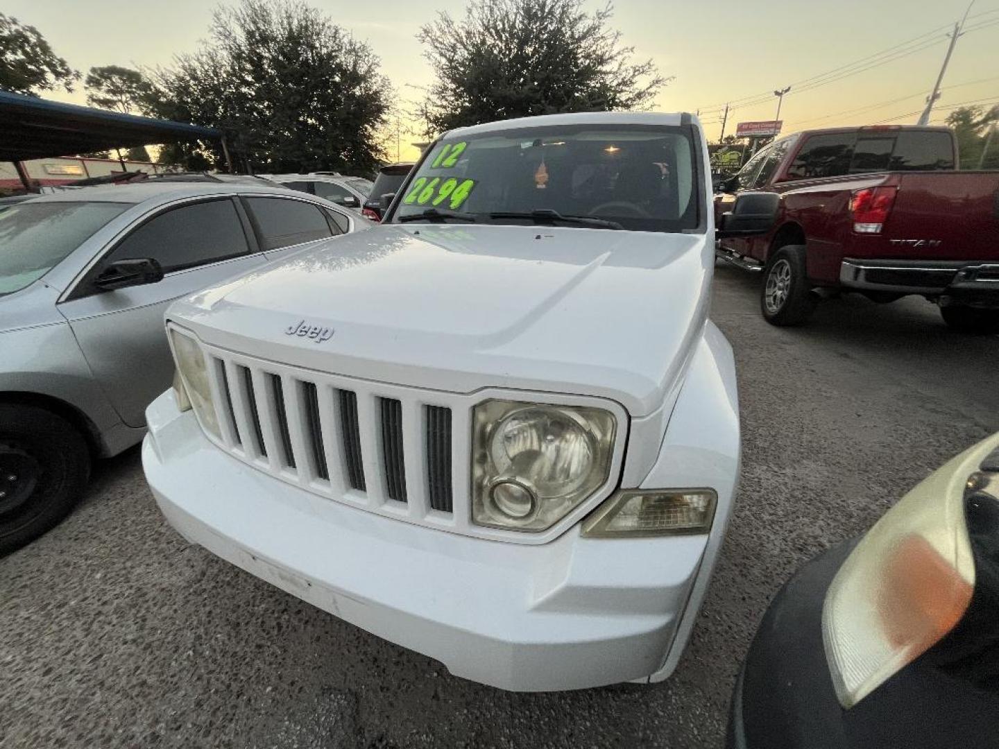 2012 WHITE JEEP LIBERTY Sport 2WD (1C4PJLAK0CW) with an 3.7L V6 SOHC 12V engine, AUTOMATIC transmission, located at 2303 West Mt. Houston, Houston, 77038, (281) 507-3956, 29.771597, -95.339569 - Photo#3