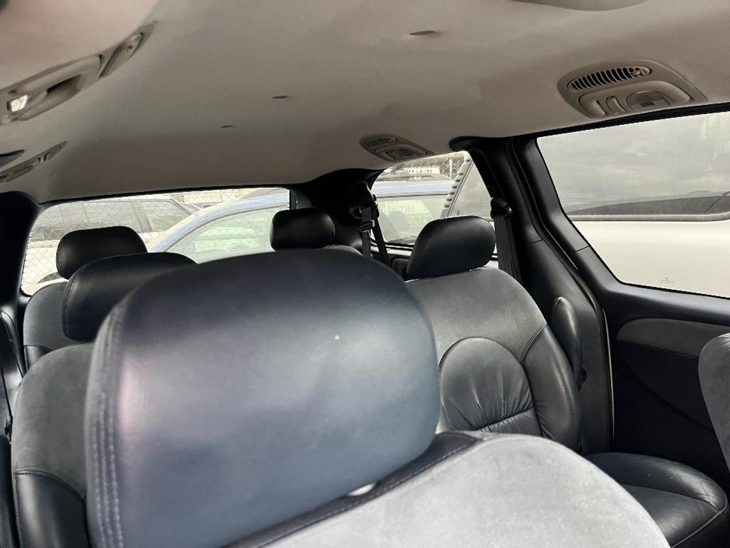 2001 BLUE CHRYSLER TOWN and COUNTRY Limited (2C8GP64L41R) with an 3.8L V6 OHV 12V engine, AUTOMATIC transmission, located at 2303 West Mt. Houston, Houston, 77038, (281) 507-3956, 29.771597, -95.339569 - Photo#1