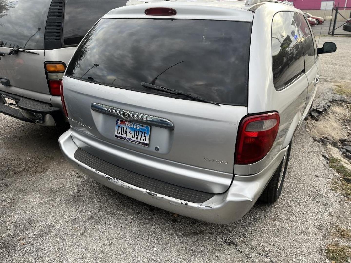 2001 BLUE CHRYSLER TOWN and COUNTRY Limited (2C8GP64L41R) with an 3.8L V6 OHV 12V engine, AUTOMATIC transmission, located at 2303 West Mt. Houston, Houston, 77038, (281) 507-3956, 29.771597, -95.339569 - Photo#2