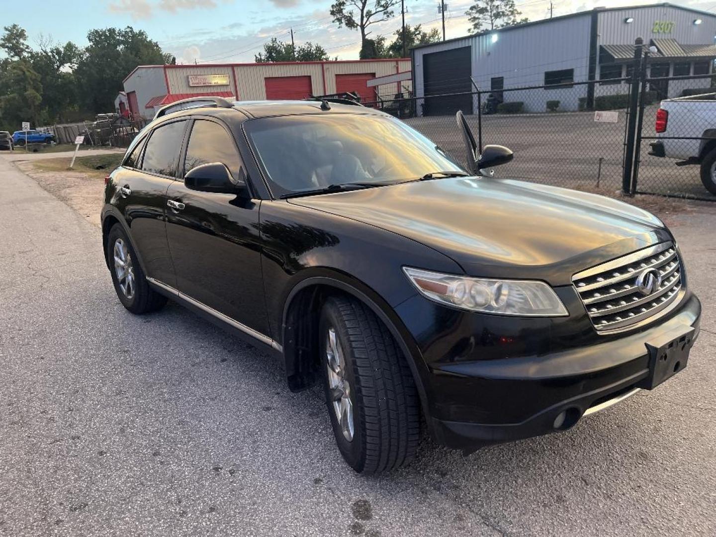 2008 BLACK INFINITI FX FX35 2WD (JNRAS08U18X) with an 3.5L V6 DOHC 24V engine, AUTOMATIC transmission, located at 2303 West Mt. Houston, Houston, 77038, (281) 507-3956, 29.771597, -95.339569 - Photo#0