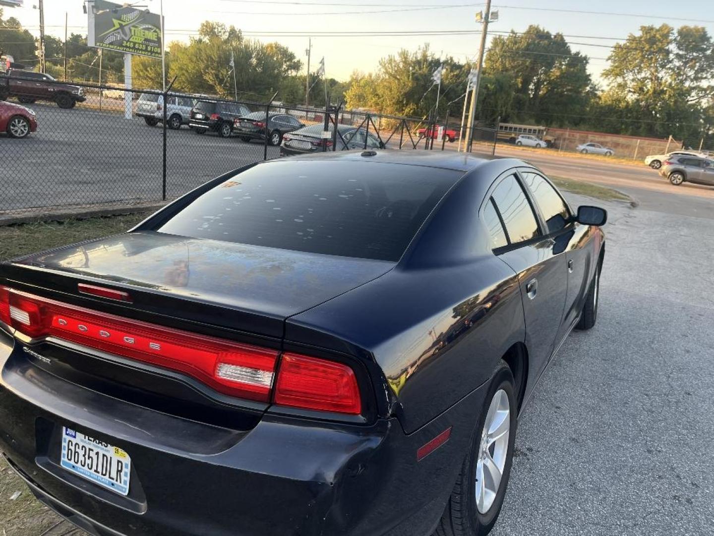 2012 BLACK DODGE CHARGER SE (2C3CDXBG4CH) with an 3.6L V6 DOHC 24V engine, AUTOMATIC transmission, located at 2303 West Mt. Houston, Houston, 77038, (281) 507-3956, 29.771597, -95.339569 - Photo#1
