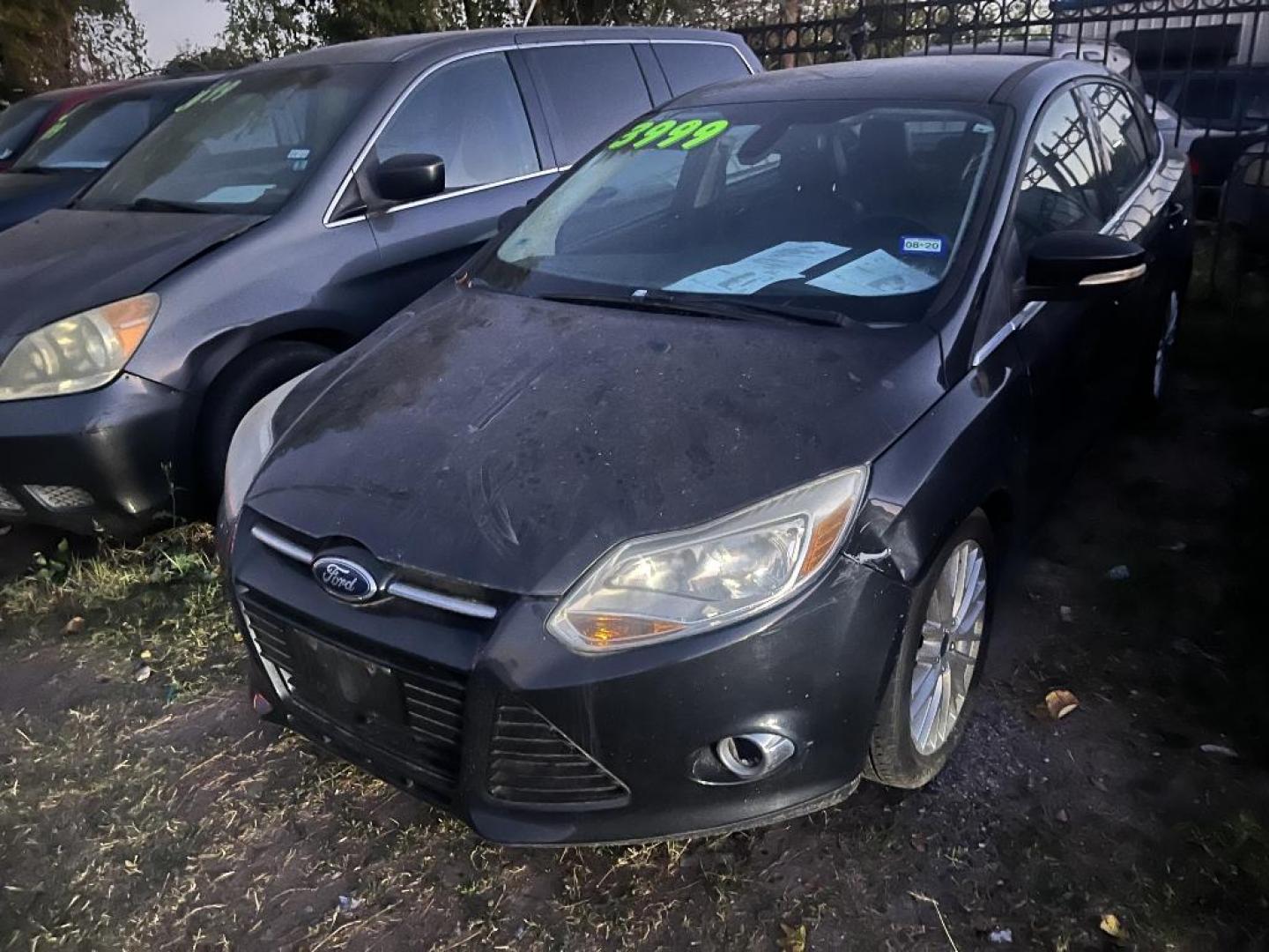 2012 BLACK FORD FOCUS SEL Sedan (1FAHP3H21CL) with an 2.0L L4 DOHC 16V engine, AUTOMATIC transmission, located at 2303 West Mt. Houston, Houston, 77038, (281) 507-3956, 29.771597, -95.339569 - Photo#0