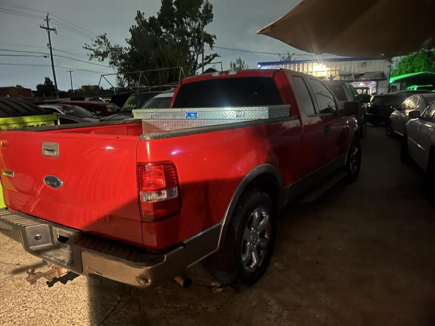 2004 RED FORD F-150 XLT SuperCab 5.5-ft Box 2WD (1FTPX12574N) with an 5.4L V8 SOHC 16V engine, AUTOMATIC transmission, located at 2303 West Mt. Houston, Houston, 77038, (281) 507-3956, 29.771597, -95.339569 - Photo#2