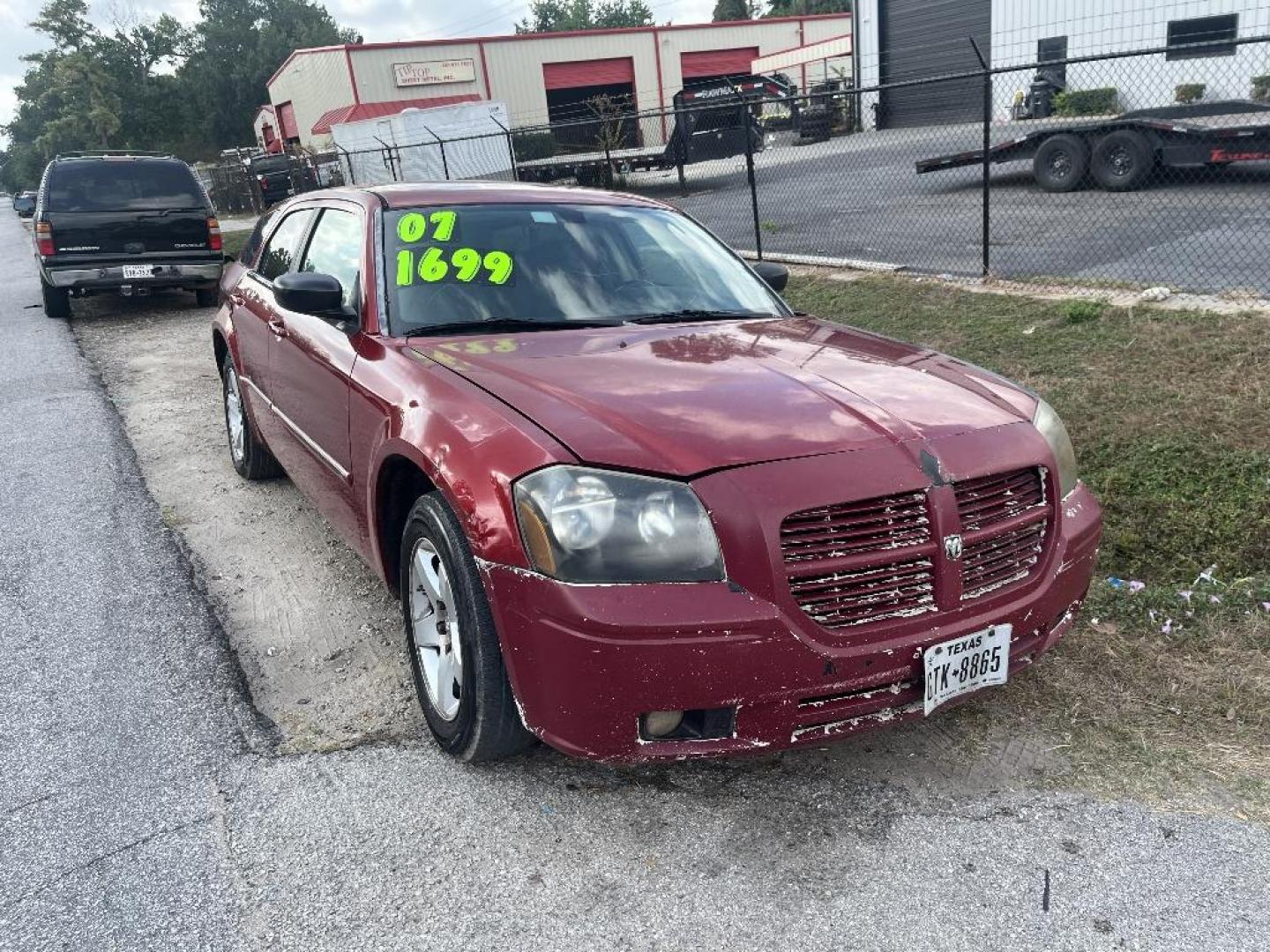 2007 RED DODGE MAGNUM SXT (2D4FV47V97H) with an 3.5L V6 SOHC 24V engine, AUTOMATIC transmission, located at 2303 West Mt. Houston, Houston, 77038, (281) 507-3956, 29.771597, -95.339569 - Photo#0