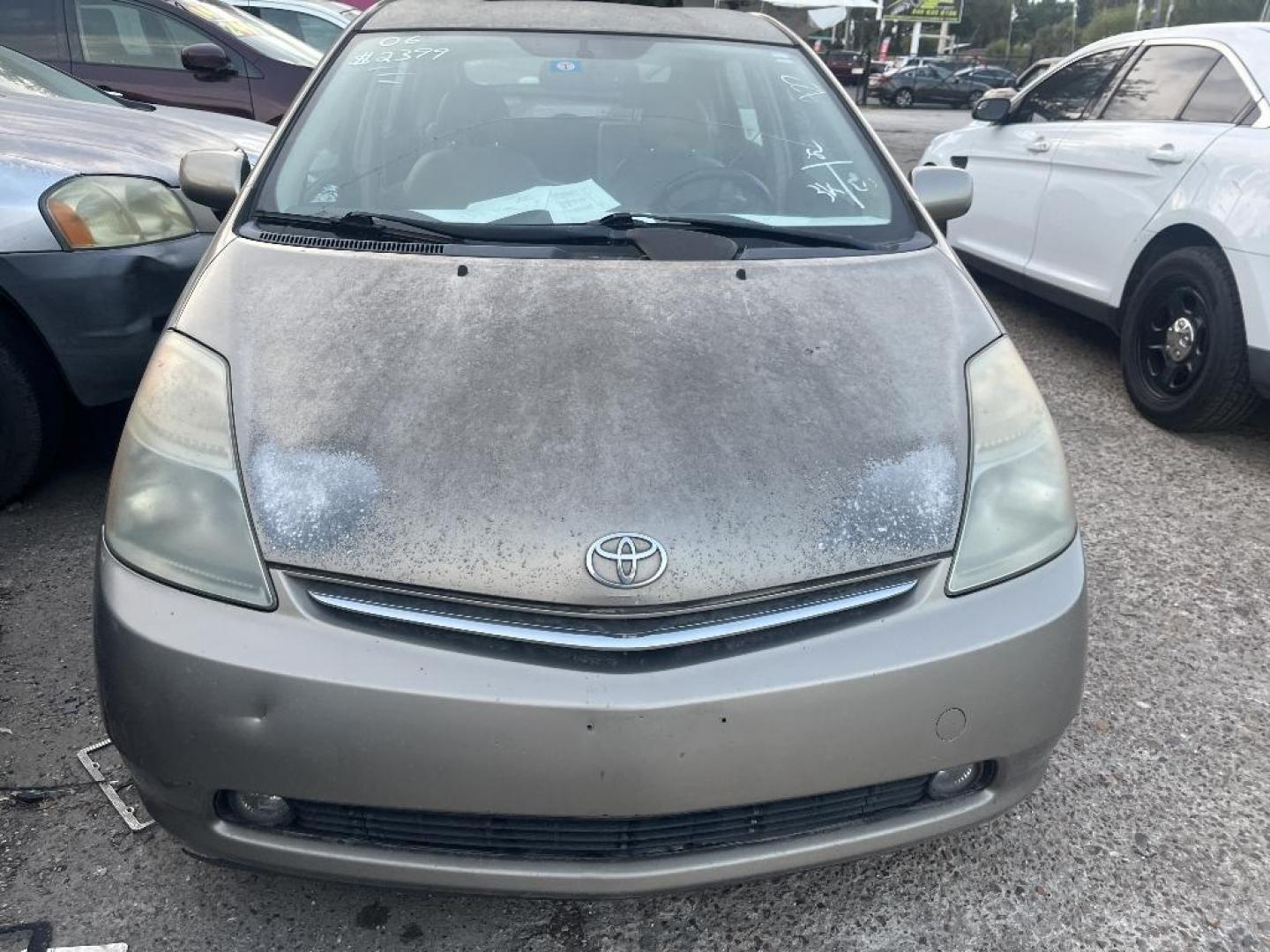 2006 BROWN TOYOTA PRIUS 4-Door Liftback (JTDKB20U663) with an 1.5L L4 DOHC 16V HYBRID engine, AUTOMATIC transmission, located at 2303 West Mt. Houston, Houston, 77038, (281) 507-3956, 29.771597, -95.339569 - Photo#0