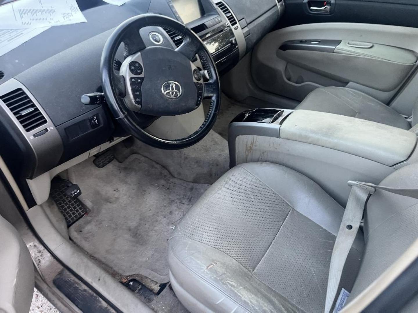 2006 BROWN TOYOTA PRIUS 4-Door Liftback (JTDKB20U663) with an 1.5L L4 DOHC 16V HYBRID engine, AUTOMATIC transmission, located at 2303 West Mt. Houston, Houston, 77038, (281) 507-3956, 29.771597, -95.339569 - Photo#2