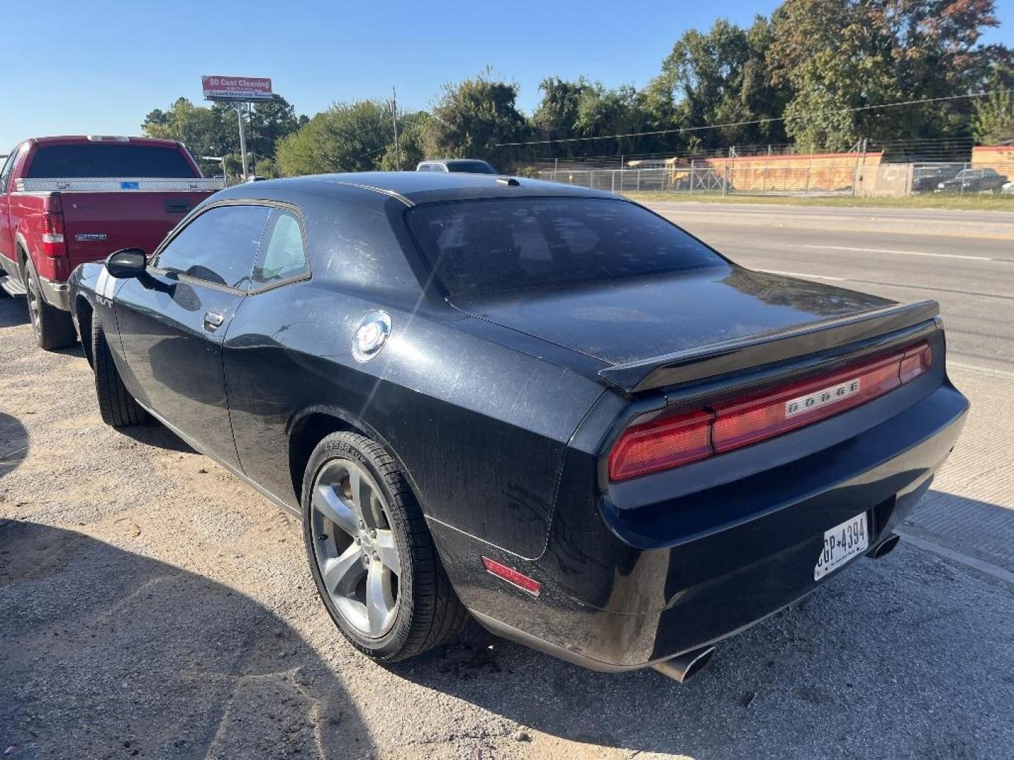 2014 BLACK DODGE CHALLENGER R/T (2C3CDYBT7EH) with an 5.7L V8 OHV 16V engine, AUTOMATIC transmission, located at 2303 West Mt. Houston, Houston, 77038, (281) 507-3956, 29.771597, -95.339569 - Photo#1