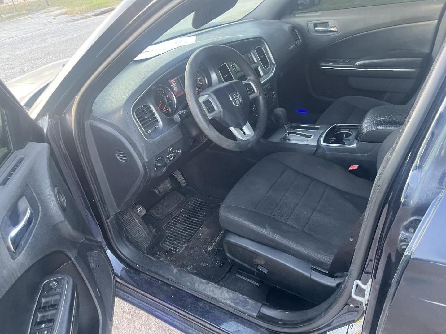 2012 BLACK DODGE CHARGER SE (2C3CDXBG4CH) with an 3.6L V6 DOHC 24V engine, AUTOMATIC transmission, located at 2303 West Mt. Houston, Houston, 77038, (281) 507-3956, 29.771597, -95.339569 - Photo#2