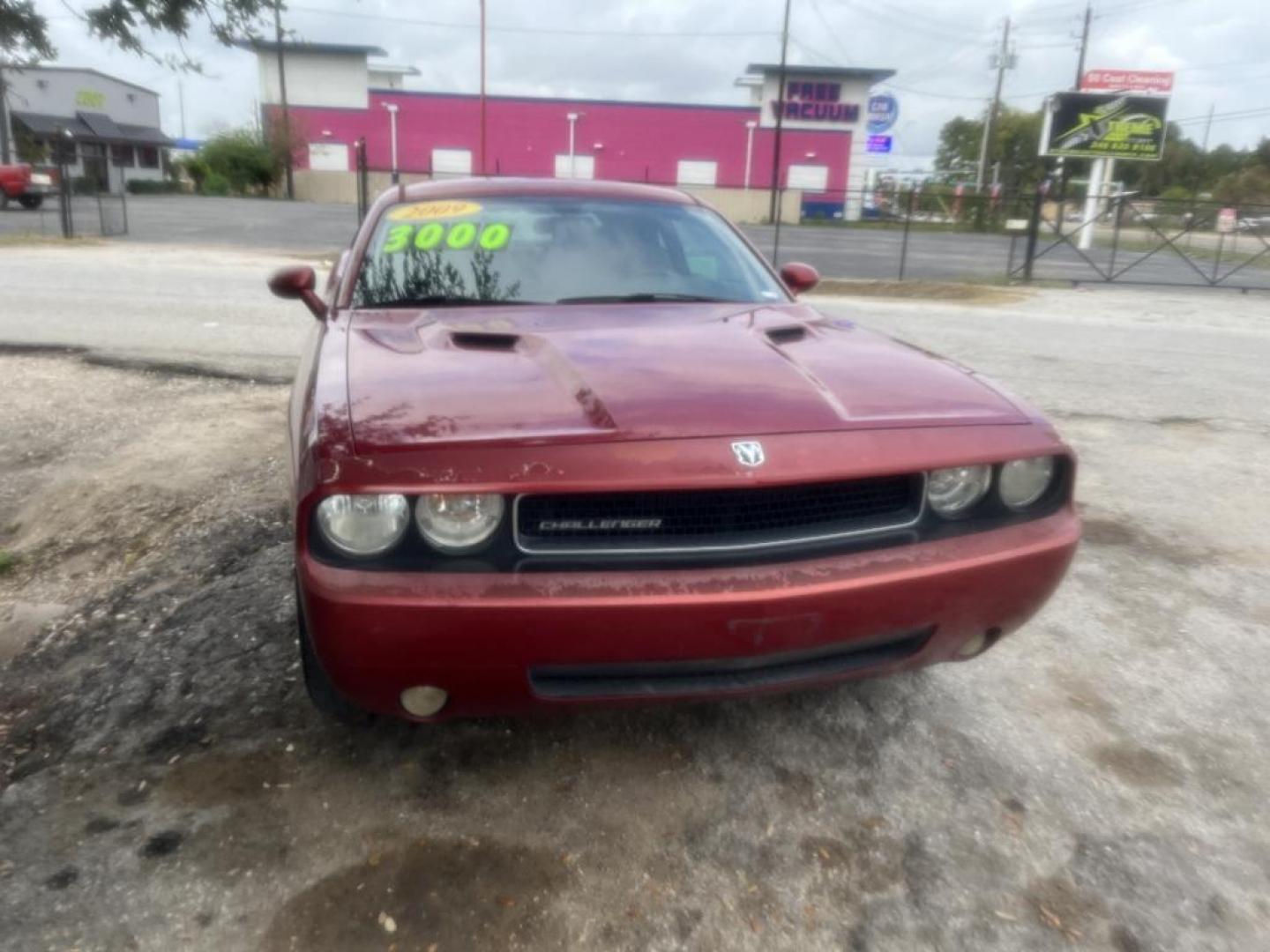 2009 ORANGE DODGE CHALLENGER SE (2B3LJ44V89H) with an 3.5L V6 SOHC 24V engine, AUTOMATIC transmission, located at 2303 West Mt. Houston, Houston, 77038, (281) 507-3956, 29.771597, -95.339569 - Photo#0