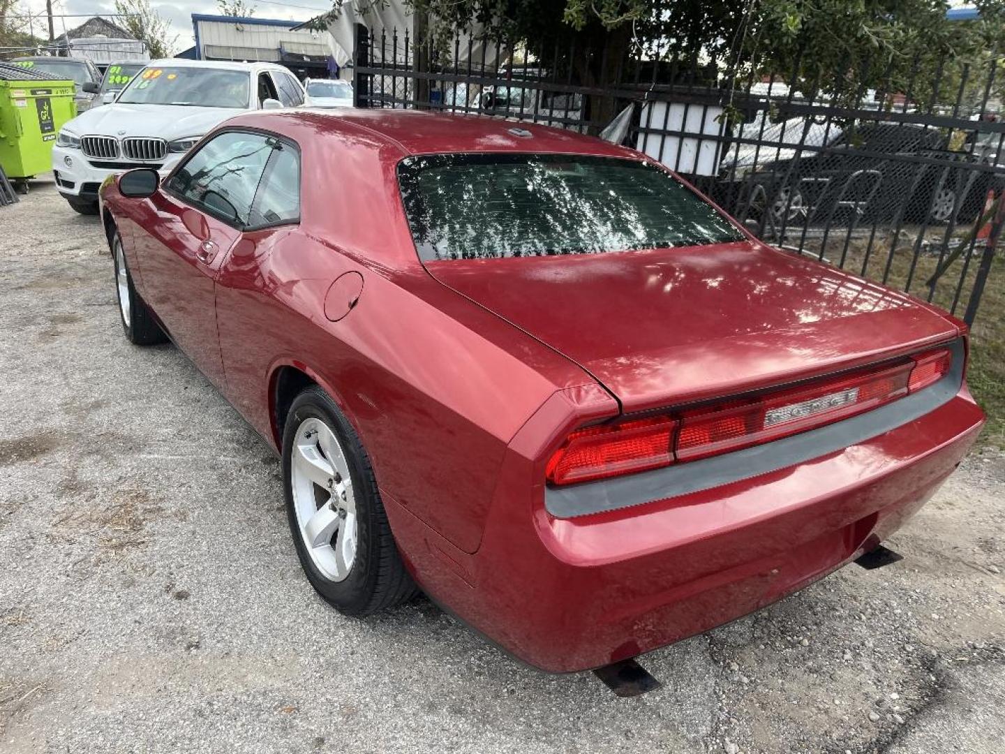 2009 ORANGE DODGE CHALLENGER SE (2B3LJ44V89H) with an 3.5L V6 SOHC 24V engine, AUTOMATIC transmission, located at 2303 West Mt. Houston, Houston, 77038, (281) 507-3956, 29.771597, -95.339569 - Photo#2