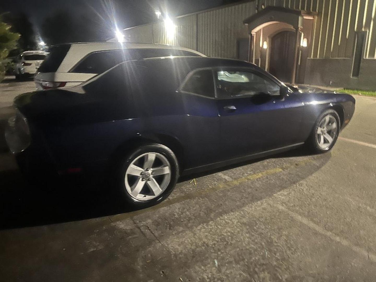 2014 BLACK DODGE CHALLENGER SXT (2C3CDYAG7EH) with an 3.6L V6 DOHC 24V engine, AUTOMATIC transmission, located at 2303 West Mt. Houston, Houston, 77038, (281) 507-3956, 29.771597, -95.339569 - Photo#1