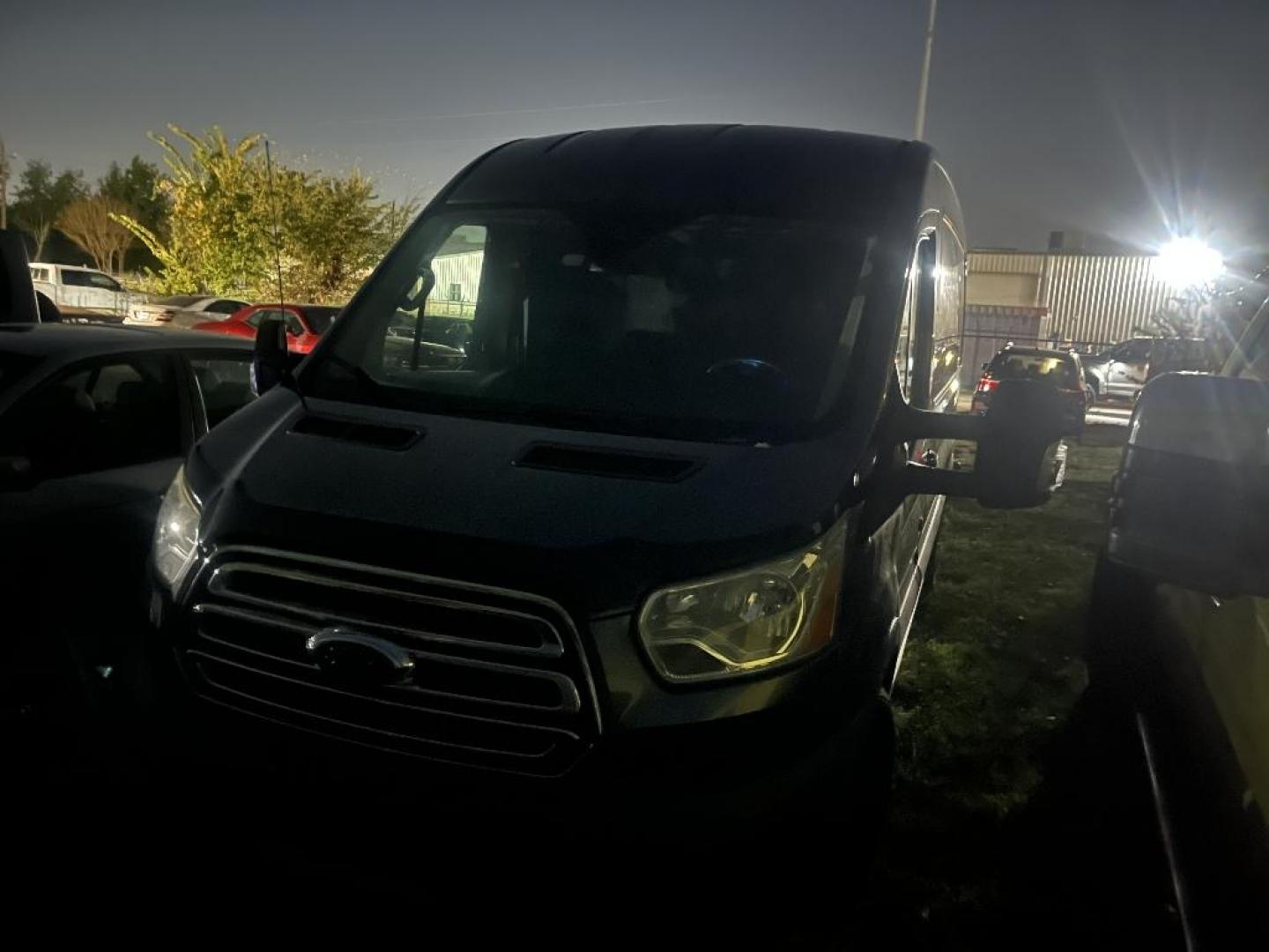 2016 BROWN FORD TRANSIT 350 Van Med. Roof w/Sliding Pass. 148-in. WB (1FTBW2CG3GK) with an 3.5L V6 DOHC 24V engine, AUTOMATIC transmission, located at 2303 West Mt. Houston, Houston, 77038, (281) 507-3956, 29.771597, -95.339569 - Photo#0