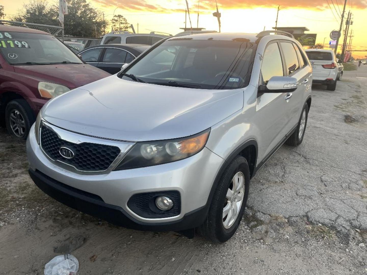 2012 GRAY KIA SORENTO LX 2WD (5XYKT3A62CG) with an 2.4L L4 DOHC 16V engine, AUTOMATIC transmission, located at 2303 West Mt. Houston, Houston, 77038, (281) 507-3956, 29.771597, -95.339569 - Photo#0