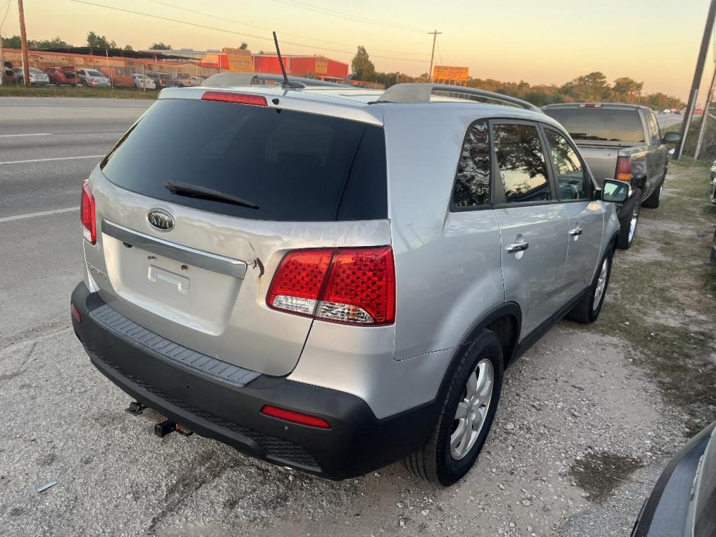 2012 GRAY KIA SORENTO LX 2WD (5XYKT3A62CG) with an 2.4L L4 DOHC 16V engine, AUTOMATIC transmission, located at 2303 West Mt. Houston, Houston, 77038, (281) 507-3956, 29.771597, -95.339569 - Photo#2
