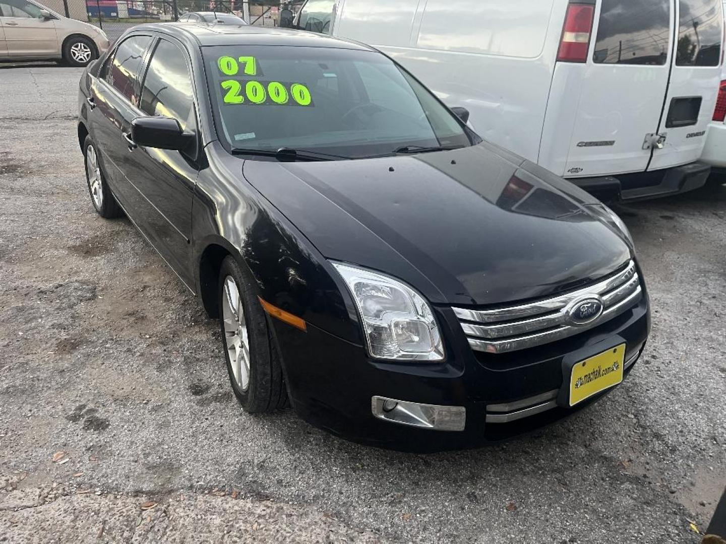 2007 BLACK FORD FUSION SEL (3FAHP08ZX7R) with an 2.3L L4 DOHC 16V engine, MANUAL transmission, located at 2303 West Mt. Houston, Houston, 77038, (281) 507-3956, 29.771597, -95.339569 - Photo#0