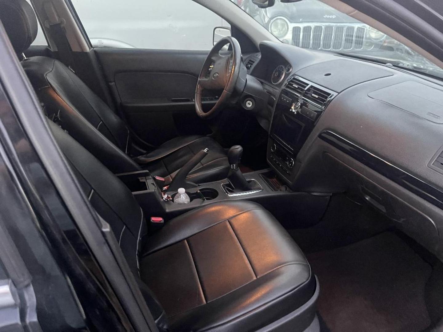 2007 BLACK FORD FUSION SEL (3FAHP08ZX7R) with an 2.3L L4 DOHC 16V engine, MANUAL transmission, located at 2303 West Mt. Houston, Houston, 77038, (281) 507-3956, 29.771597, -95.339569 - Photo#2