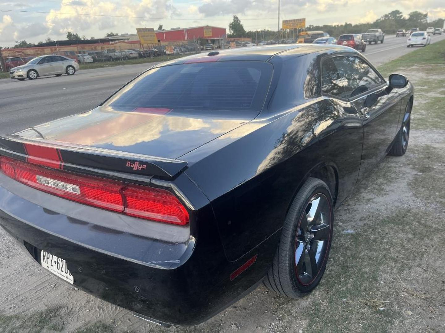 2013 BLACK DODGE CHALLENGER SXT (2C3CDYAG6DH) with an 3.6L V6 DOHC 24V engine, AUTOMATIC transmission, located at 2303 West Mt. Houston, Houston, 77038, (281) 507-3956, 29.771597, -95.339569 - Photo#1